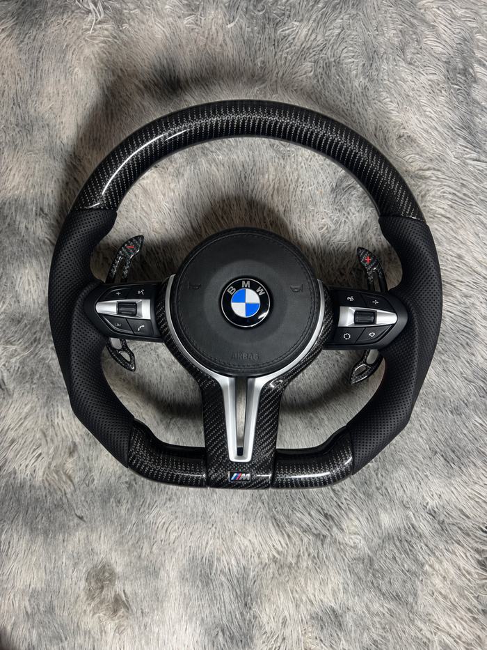 Volante BMW Fibra de Carbono , levas magneticas